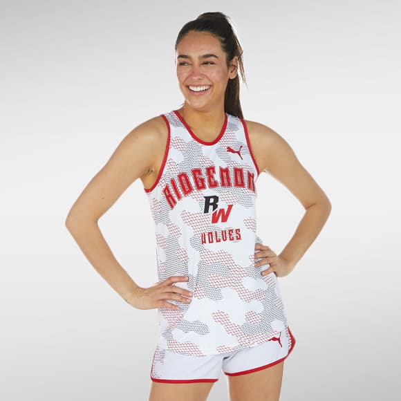 A girl track athlete wearing PUMA track and field apparel